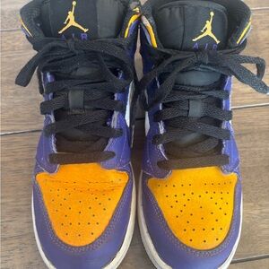 Nike Air Jordan’s Purple and Gold High-Tops